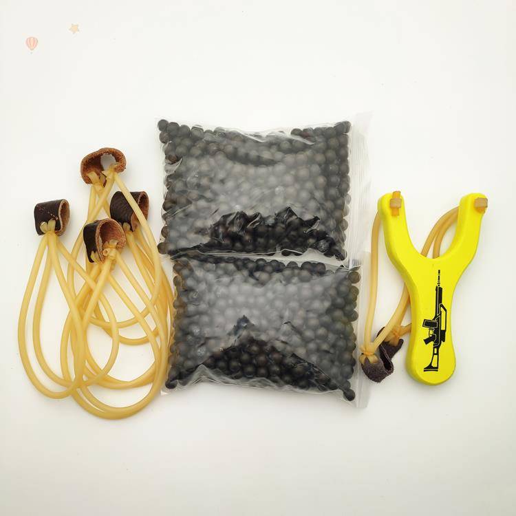 Yellow slingshot + 1,000 mudballs + 4 bands